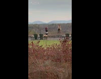 girl stand small stone rock ledge