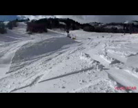 Guy jumps snowboard falls fail parking lot 