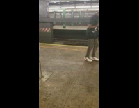 Guy walks around saying sorry and forgive me in subway train