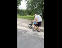 Kid struggles to ride bike tells to throw it away