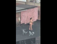 Couple hugs and shower in the rain