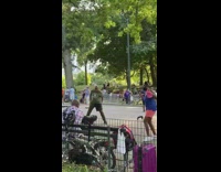 People dance central park green shirt guy