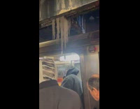 Long icicles drip near train 