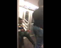 Guy dances and slides on pole on subway train