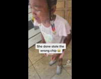 Little girl cries, eats the wrong chip 