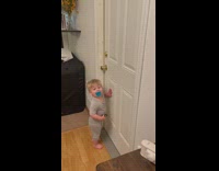 Baby excited waiting for dad returning home 
