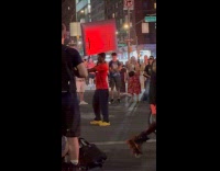 Man TV on head dance with skater