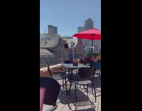 Woman shows guy how to pose 