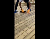 Guy slaps fish and tries to remove hook