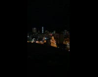 Skyscraper view at night in time lapse 360 degree video