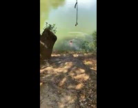 Guy rope swings but falls on dirt