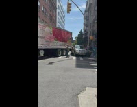 Silver car crashes on street 