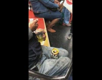 Pt. 2 Man blue hat keeps live crab in cup of beer on subway train