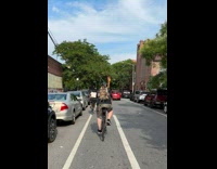 Guy biking with bow and arrow