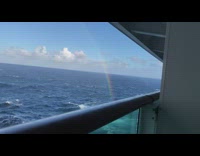 Full rainbow arc in the ocean ship