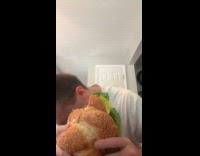 Man eating huge sandwich