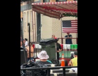 Collab WINY - Man dance balance green trash bin on head