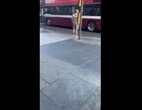 Man films video middle of the street