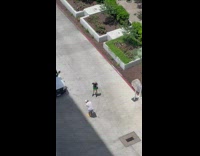 Blonde girl green skirt pose on street