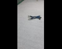 Ice skater tries to cartwheel on ice rink, slips and falls