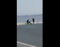 Man DJ top of twin peaks video shoot