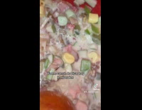 Woman puts whole apple tired of chopping