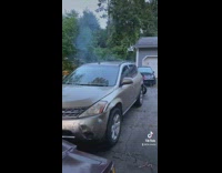 Guy lights fire into car 