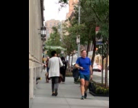Collab Subway Creatures - Man walks uses big leaf as umbrella