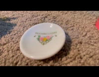 Pink blob suck teal slime on plate