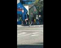 Woman jumps on street for pictures 