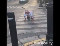 Drunk Man Crawls Across Street