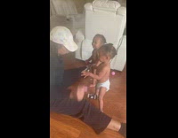 Woman pretends to argue with 2 baby girls 