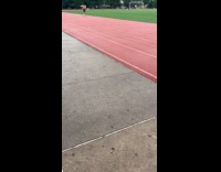 Man carry another man at oval track