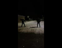 Guy throws huge snowball at friend knocks over 
