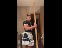 Muscular guy wears maid costume