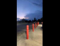 Man filming storm clouds forming 