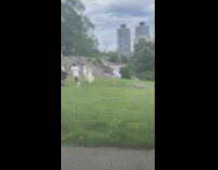 People filming parody of wizard of oz at park