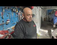 Man put fire on finger to lit cigarette