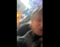 Dog sneeze directly on face of man