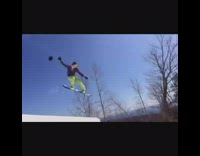 bright green pants slow motion snow boarder