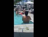 Woman blue bikini fruit bowl poolside pictorial