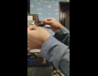 Guy stretches piece of tape out 