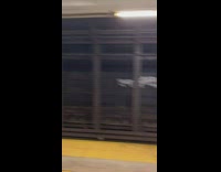 Woman gives haircut at Penn Station 