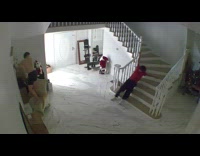 Guy falls while running down stairs 