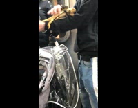 Guy with bearded dragon wearing leash subway