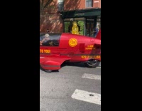 Man drives down street with autocycle aircraft