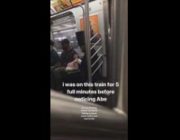 Guy dressed as abraham lincoln on subway