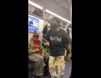Man rap and dance in subway train