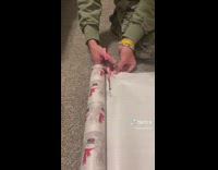 Collab ClipsIG - Guy wrecks gift wrapper instead of a straight cut 