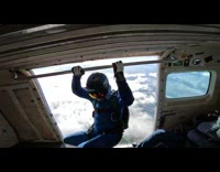 Guy jumps out of airplane to skydive 